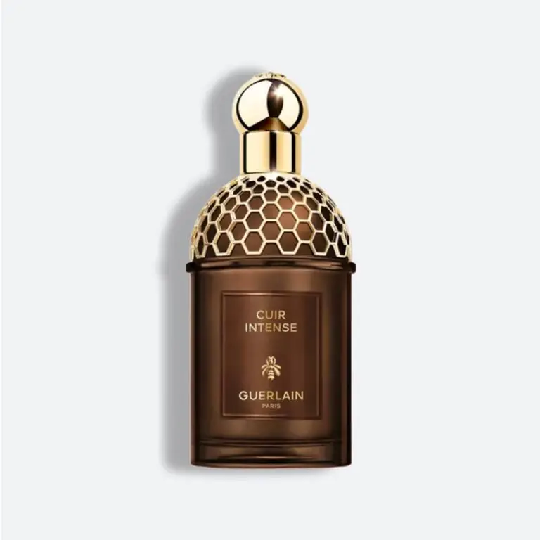 زجاجة عطر كوير إنتنس من جيرلان بلمسات ذهبية وغطاء مزين بشبكة خلية النحل