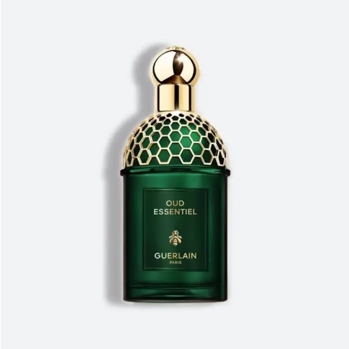 زجاجة عطر عود إسانشيال من جيرلان بلون أخضر داكن وغطاء ذهبي